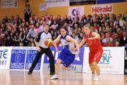 31 January 2010; Grainne Dwyer, Team Montenotte Hotel Cork, in action against Sarah McGrath, DCU Mercy. Women's Superleague National Cup Final 2010, Team Montenotte Hotel Cork v DCU Mercy, National Basketball Arena, Tallaght, Dublin. Picture credit: Brendan Moran / SPORTSFILE