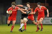 4 February 2010; Dave Ryan, Munster A, holds off the tackle from Shane Casey, Connacht A. Interprovincial Representative, Munster A v Connacht A, Thomond Park, Limerick. Picture credit: Diarmuid Greene / SPORTSFILE