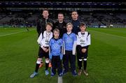 27 January 2016; Match referee Padraig Hughes, with the two captains Conor McManus and Stephen Cluxton with Allianz mascots Mark Butler, second from left, and his brother Christopher, from Bayside N.S., and 'Young Whistelers' Rory Perry, extreme left, Scoil Mológa, Harold's Cross and Harry Collier, right, St Helen's Portmarnock, before the game. Allianz Football League, Division 1, Round 3, Dublin v Monaghan. Croke Park, Dublin. Picture credit: Ray McManus / SPORTSFILE