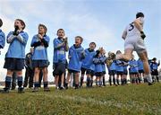 7 February 2010; Young members of Eadestown GFC, Kildare, cheer on the Kildare players as they make their way out for the start of the match. St Conleth's Park, Newbridge, Co. Kildare. Picture credit: Brian Lawless / SPORTSFILE