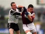 21 April 2001; Padraic Joyce of Galway attempts to hold off the challenge of Padraig Doohan of Sligo during the Allianz GAA National Football League Division 1 Semi-Final match between Galway and Sligo in Dr Hyde Park in Roscommon. Photo by Damien Eagers/Sportsfile