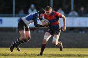 10 February 2010; Tom Goggin, St Munchin's, is tackled by Eoghan Cross, Crescent. Avonmore Milk Munster Schools Senior Cup Quarter-Final, Crescent College Comprehensive v St Munchin's College, Dooradoyle, Limerick. Picture credit: Diarmuid Greene / SPORTSFILE