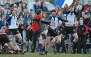 10 February 2010; Brian Mullins, St Munchin's, kicks the ball into touch to end the game despite the attempted block from Eoghan Cross, left, and Padraig Monaghan, Crescent. Avonmore Milk Munster Schools Senior Cup Quarter-Final, Crescent College Comprehensive v St Munchin's College, Dooradoyle, Limerick. Picture credit: Diarmuid Greene / SPORTSFILE