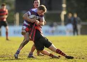 11 February 2010; Garret O'Suilleabhain, Clongowes Wood College SJ, in action against Danny Ruddock, Kilkenny College. Leinster Schools Senior Cup Quarter-Final, Clongowes Wood College SJ v Kilkenny College, Templeville Road, Dublin. Picture credit: Pat Murphy / SPORTSFILE