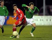 11 February 2010; George Smith, Republic of Ireland, in action against Norbert Bodo, Hungary. Under 17 International Friendly, Republic of Ireland v Hungary, Carlisle Grounds, Bray, Co. Wicklow. Picture credit: Pat Murphy / SPORTSFILE