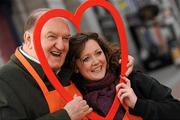 12 February 2010; Alan Kerins Projects found love for everyone this Valentine's Weekend with 'Hug for Haiti’. A fundraising initiative, saw Grafton Street lined with sports stars, personalities and celebrities, sharing the love and giving hugs to celebrate Valentine's Day, whilst raising money to support the relief effort in Haiti. Pictured are George Hook with Gillian Collins, from Cork. The street was awash with members of the Dublin Hurling and Football teams, presenters and stars from RTÉ and Today FM, rugby players and reality show personalities - all offering hugs to the public. While the initiative gave people the opportunity to meet their idols and get memorable moments with them, all monies raised will be going towards a greater good in helping those devastated by the recent earthquake in Haiti. For further information on ‘Hug for Haiti’ or the Alan Kerins Projects, log on to www.alankerins.ie. Grafton Street, Dublin. Photo by Sportsfile