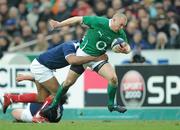 13 February 2010; Keith Earls, Ireland, is tackled by theirry Dusautoir, France. RBS Six Nations Rugby Championship, France v Ireland, Stade de France, Saint Denis, Paris, France. Picture credit: Brendan Moran / SPORTSFILE