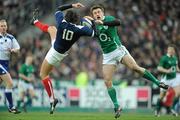 13 February 2010; Francois Trinh-Duc, France, collects a garryowen from Tommy Bowe, Ireland. RBS Six Nations Rugby Championship, France v Ireland, Stade de France, Saint Denis, Paris, France. Picture credit: Brendan Moran / SPORTSFILE