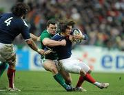 13 February 2010; Allexis Palisson, France, is tackled by Cian Healy, Ireland. RBS Six Nations Rugby Championship, France v Ireland, Stade de France, Saint Denis, Paris, France. Picture credit: Brian Lawless / SPORTSFILE