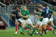 13 February 2010; Jamie Heaslip and Ronan O'Gara, Ireland, in action against Mathieu Bastareaud, left, and Morgan Parra, France. RBS Six Nations Rugby Championship, France v Ireland, Stade de France, Saint Denis, Paris, France. Picture credit: Brian Lawless / SPORTSFILE