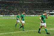 13 February 2010; Dejected Ireland players, from left, Brian O'Driscoll, David Wallace and Cian Healy leave the pitch after defeat to France. RBS Six Nations Rugby Championship, France v Ireland, Stade de France, Saint Denis, Paris, France. Picture credit: Brendan Moran / SPORTSFILE