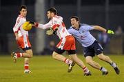 13 February 2010; Mark Lynch, Derry, in action against Michael Mac Auley, Dublin. Allianz National Football League, Division 1, Round 2, Dublin v Derry, Parnell Park, Dublin. Picture credit: Pat Murphy / SPORTSFILE