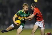 13 February 2010; Barry John Walsh, Kerry, is tackled by Kieran O'Leary, Cork. Allianz National Football League, Division 1, Round 2, Cork v Kerry, Pairc Ui Rinn, Cork. Picture credit: Matt Browne / SPORTSFILE