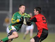 13 February 2010; Graham Reilly, Meath, in action against Kevin McKernnan, Down. Allianz National Football League, Division 2, Round 2, Down v Meath, Pairc Esler, Newry, Co. Down. Picture credit: Oliver McVeigh / SPORTSFILE