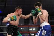 13 February 2010; Oisin Fagan, left, exchanges punches with Andy Murray during their Irish Lightweight Title fight. Yanjing Fight Night, Andy Murray v Oisin Fagan, National Stadium, Dublin. Picture credit: Stephen McCarthy / SPORTSFILE