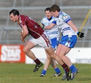 14 February 2010; Joe Brgin, Galway, in action against Darren Hughes, Monaghan. Allianz National Football League, Division 1, Round 2, Galway v Monaghan, Pearse Stadium, Galway. Picture credit: Ray Ryan / SPORTSFILE