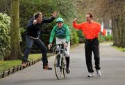 15 February 2010; At the Launch of the Jockey Olympics in aid of the GOAL Haiti Appeal are Jockey Barry Geraghty with Hector O'hEochagain, left, and Gerry Loftus, right. Launch of the Jockey Olympics in aid of the GOAL Haiti Appeal, St. Stephen’s Green, Dublin. Photo by Sportsfile