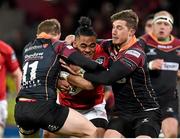 5 March 2016; Francis Saili, Munster, is tackled by Hallam Amos, left and Carl Meyer, Newport Gwent Dragons. Guinness PRO12, Round 17, Munster v Newport Gwent Dragons, Thomond Park, Limerick. Picture credit: Brendan Moran / SPORTSFILE