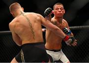 6 March 2016; Nate Diaz, right, in action against Conor McGregor during their welterweight bout. UFC 196: McGregor v Diaz. MGM Grand Garden Arena, Las Vegas, NV, USA. Picture credit: Mark J. Rebilas / SPORTSFILE