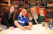 15 February 2010; Gillette Ambassador and Irish Rugby captain Brian O’Driscoll pictured with the Cotter family, from left, Molly, 8, Tim, 6, Geraldine and Rody, 2, from Blackrock, Co. Dublin, at an in-store signing in Dunnes Stores, Cornelscourt, on Monday evening. The rugby hero took the time to sign autographs and meet hundreds of fans as he launched the Gillette Fusion limited edition Irish handle razor. A limited edition razor has been specially designed donning the Irish colours to show Ireland’s pride in the rugby star and his Irish team-mates. The crowd were delighted to get the opportunity to meet the rugby star before he lines out for his next RBS 6 Nations match against England. Dunnes Stores, Cornelscourt, Dublin. Picture credit: Brendan Moran / SPORTSFILE