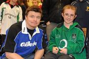 15 February 2010; Gillette Ambassador and Irish Rugby captain Brian O’Driscoll with Matthew O'Connor, age 11, from Cork, at an in-store signing in Dunnes Stores, Cornelscourt, on Monday evening. The rugby hero took the time to sign autographs and meet hundreds of fans as he launched the Gillette Fusion limited edition Irish handle razor. A limited edition razor has been specially designed donning the Irish colours to show Ireland’s pride in the rugby star and his Irish team-mates. The crowd were delighted to get the opportunity to meet the rugby star before he lines out for his next RBS 6 Nations match against England. Dunnes Stores, Cornelscourt, Dublin. Picture credit: Brendan Moran / SPORTSFILE