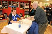15 February 2010; Gillette Ambassador and Irish Rugby captain Brian O’Driscoll pictured with Wally Taylor, age 73, from Wales, at an in-store signing in Dunnes Stores, Cornelscourt, on Monday evening. The rugby hero took the time to sign autographs and meet hundreds of fans as he launched the Gillette Fusion limited edition Irish handle razor. A limited edition razor has been specially designed donning the Irish colours to show Ireland’s pride in the rugby star and his Irish team-mates. The crowd were delighted to get the opportunity to meet the rugby star before he lines out for his next RBS 6 Nations match against England. Dunnes Stores, Cornelscourt, Dublin. Picture credit: Brendan Moran / SPORTSFILE