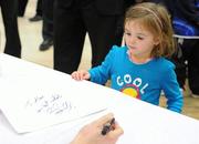 15 February 2010; Siena Stafford, age 4, from Newbridge, Co. Kildare, collects an autograph for her brother Alex, from Gillette Ambassador and Irish Rugby captain Brian O’Driscoll at an in-store signing in Dunnes Stores, Cornelscourt, on Monday evening. The rugby hero took the time to sign autographs and meet hundreds of fans as he launched the Gillette Fusion limited edition Irish handle razor. A limited edition razor has been specially designed donning the Irish colours to show Ireland’s pride in the rugby star and his Irish team-mates. The crowd were delighted to get the opportunity to meet the rugby star before he lines out for his next RBS 6 Nations match against England. Dunnes Stores, Cornelscourt, Dublin. Picture credit: Brendan Moran / SPORTSFILE