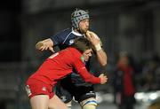 20 February 2010; Kevin McLaughlin, Leinster, is tackled by Rhys Priestland, Scarlets. Celtic League, Leinster v Scarlets. RDS, Dublin. Picture credit: Stephen McCarthy / SPORTSFILE