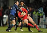 20 February 2010; Rhys Priestland, Scarlets, is tackled by Girvan Dempsey, left, and Fergus McFadden, Leinster. Celtic League, Leinster v Scarlets. RDS, Dublin. Picture credit: Stephen McCarthy / SPORTSFILE