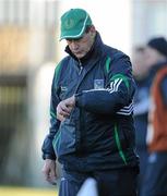 21 February 2010; Limerick manager Justin McCarthy checks his watch for the amount of time left in the game. Allianz GAA Hurling National League, Division 1 Round 1, Limerick v Galway, John Fitzgerald Park, Kilmallock, Co. Limerick. Picture credit: Brendan Moran / SPORTSFILE