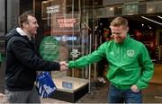 10 March 2016; To celebrate the new Republic of Ireland jersey going on sale at Life Style Sports, the brand announced today that it will be supporting Irish supporters by putting 12 football trips to France up for grabs for anyone who buys their jersey at Life Style Sports from today, 10th March, to 27th May. The first winner, Gary Kinsella, from Coolock, Dublin, was chosen this morning and he is pictured with Irish soccer legend Damien Duff in Life Style Sports on Grafton St. For further information on how to enter please see www.lifestylesports.com/greenticket. Life Style Sports, Grafton Street, Dublin. Picture credit: Brendan Moran / SPORTSFILE