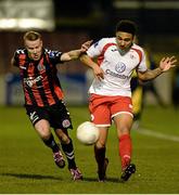 11 March 2016; Tobi Adebayo-Rowling, Sligo Rovers, in action against Lorcan Fitzgerald, Bohemians. SSE Airtricity League Premier Division, Bohemians v Sligo Rovers. Dalymount Park, Dublin.  Picture credit: Seb Daly / SPORTSFILE