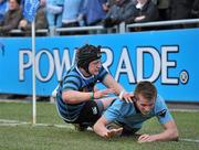 2 March 2010; David Egan, St Michael's College, scores his side's second try despite the attentions of Stephen Hackett-Delaney, St Gerard's School. Leinster Schools Senior Cup Semi-Final, St Michael's College v St Gerard's School, Donnybrook Stadium, Dublin. Picture credit: Brian Lawless / SPORTSFILE