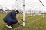 13 March 2016; Mick Boland, Kilbarrack United groundstaff, prepares the nets before the start of the game. FAI Junior Cup, Quarter-Final, in association with Aviva and Umbro, Kilbarrack United v Sheriff Youth Club. Glendale Open Space, Greendale Road, Kilbarrack, Dublin.  Picture credit: David Maher / SPORTSFILE