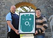 4 March 2010; Ireland team captain Brian O'Driscoll presents team-mate and PUMA ambassador John Hayes with a commemorative jersey to mark his 100th Cap for Ireland from official Irish kit sponsor PUMA. Carton House, Maynooth, Co. Kildare. Picture credit: Matt Browne / SPORTSFILE