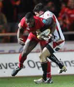 5 March 2010; Ulster's Ian Humphreys stops Joe Ajuwa, Llanelli Scarlets, scoring in the corner. Celtic League, Llanelli Scarlets v Ulster, Parc Y Scarlets, Llanelli, Wales. Picture credit: Steve Pope / SPORTSFILE