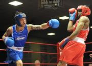 6 March 2010; Karl Kinga, Mount Tallant, dodges the left of Conal Hall, Clonard, during their men's novice 67kg bout. Men's Novice National Championships 2010 Finals - Saturday Afternoon Session, National Stadium, Dublin. Picture credit: Stephen McCarthy / SPORTSFILE