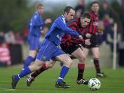 26 April 2001; Sean Purdy of Longford Town in action against Alan Kirby of Waterford United during the FAI Harp Lager Cup Semi-Final Replay match between Longford Town and Waterford Town at Flancare Park in Longford. Photo by David Maher/Sportsfile
