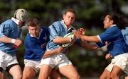 3 April 2001; Dominic Crotty of Garryowen is tackled by John McWeeney, left, and Eddie Heckenui of St Mary's during the AIB League Division One match between St Mary's and Garryowen at Templeville Road in Dublin. Photo by Matt Browne/Sportsfile