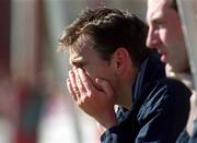6 May 2001; A dejected Pat Fenlon of Shelbourne sits in the team dugout after the Eircom League Premier Division match between Shelbourne and Cork City at Tolka Park in Dublin. Photo by David Maher/Sportsfile