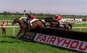 6 May 2001; Rathbawn Prince, with Barry Geraghty up, 4, jumps the last ahead of eventual winner Davids Lad with Timmy Murphy up to win the Powers Gold Label Irish Grand National Steeplechase Handicap at Fairyhouse Racecourse in Meath. Photo by Sportsfile