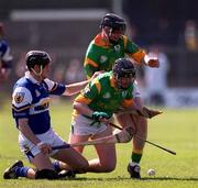 7 May 2001; Paul Cuddy of Laois in action against Nicky Horan, centre, and John Donoghue of Meath during the Guinness Leinster Senior Hurling Championship First Round match between Laois and Meath at O'Connor Park in Tullamore, Offaly. Photo by Ray McManus/Sportsfile