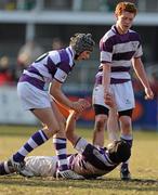 11 March 2010; Clongowes Wood College SJ players Iain Brady, left, and Cormac Gillick console Oscar Hassett following their side's defeat. Leinster Schools Junior Cup Semi-Final, Clongowes Wood College SJ v Terenure College, Donnybrook Stadium, Donnybrook, Dublin. Picture credit: Jack Halpin / SPORTSFILE