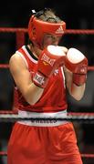 6 March 2010; Katie Taylor, Bray, Ireland, in action against Julia Tsyplakova, Ukraine, following their women's 60kg special bout. Men's Elite & Women's Novice National Championships 2010 Finals - Saturday Evening Session, National Stadium, Dublin. Picture credit: Stephen McCarthy / SPORTSFILE