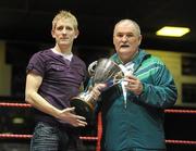 6 March 2010; IABA president Dominic O'Rourke presents Eric Donovan, St Michaels Athy, with the boxer of the tournament award. Men's Elite & Women's Novice National Championships 2010 Finals - Saturday Evening Session, National Stadium, Dublin. Picture credit: Stephen McCarthy / SPORTSFILE