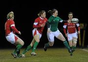 12 March 2010; Niamh Briggs, Ireland, in action against, from left, Catrin Edwards, Aimee Young, and Naomi Young, Wales. Women's Six Nations Rugby Championship, Ireland v Wales, Ashbourne RFC, Ashbourne, Co. Meath. Picture credit: Brian Lawless / SPORTSFILE