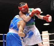 12 March 2010; Gary Molloy, Ireland, exchanges punches with Vincenzo Picardo, Italy, during their 51kg bout. Elite International, National Stadium, Dublin. Picture credit: Stephen McCarthy / SPORTSFILE