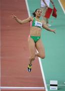 13 March 2010; Naide Gomes, Portugal, on her way to finishing in first place in the heats for the Women's Long Jump final at the 13th IAAF World Indoor Athletics Championships, Doha, Qatar. Picture credit: Pat Murphy / SPORTSFILE