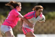 19 March 2016; Caroline O'Hanlon, Armagh and 2014 All Stars, in action against Marie Ambrose, Cork and 2015 All Stars. TG4 Ladies Football All-Star Tour, 2014 All Stars v 2015 All Stars. University of San Diego, Torero Stadium, San Diego, California, USA. Picture credit: Brendan Moran / SPORTSFILE