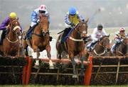 17 March 2010; Peddlers Cross, right, with Jason Maguire up, jumps the last on their way to winning the Neptune Investment Management Novices' Hurdle ahead of Reve de Sivola, with Daryl Jacob up. Cheltenham Racing Festival - Wednesday. Prestbury Park, Cheltenham, Gloucestershire, England. Photo by Sportsfile